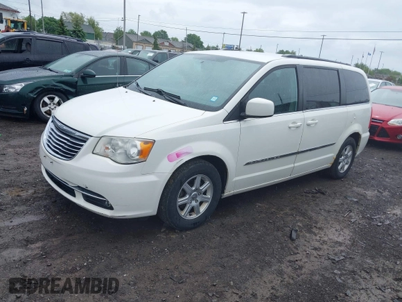2012 Chrysler Town & Country Touring z VIN 2C4RC1BG8CR320482, wystawiony jako IAAI lot #42356898 z przebiegiem 189 246 mil mil oraz . Historia ofert i sprzedaży dostępna na DreamBid. Obrazek 2.