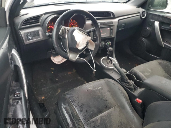 2014 Scion tC z VIN JTKJF5C78E3086696, wystawiony jako Copart lot #84040544 z przebiegiem 83 973 mil mil oraz Szkoda całkowita • Salvage title. Historia ofert i sprzedaży dostępna na DreamBid. Obrazek 8.