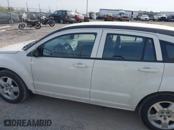 2007 Dodge Caliber SXT with VIN 1B3HB48B57D317870, listed as a IAAI auction lot 42123469 with 170,570 mi miles and . Bid and sale history available at DreamBid. Image 14.