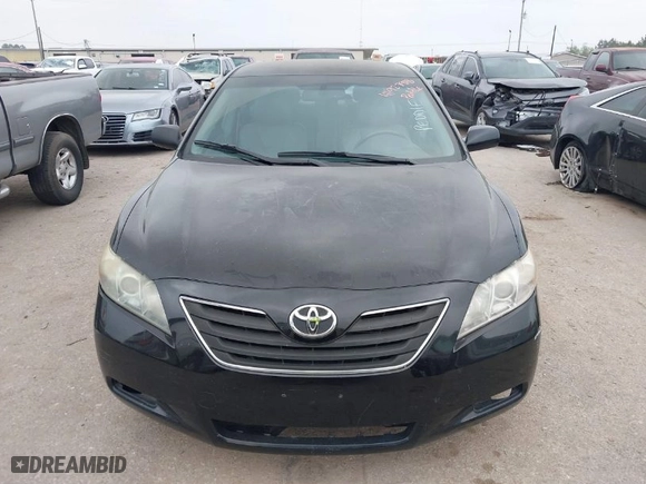 2007 Toyota Camry Hybrid with VIN JTNBB46K873038633, listed as a IAAI auction lot 41927918 with 203,466 mi miles. Bid and sale history available at carsss.com. Image 6.
