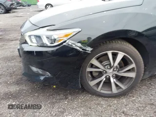 2016 Nissan Maxima SV z VIN 1N4AA6AP1GC406366, wystawiony jako IAAI lot #42266174 z przebiegiem 84 076 mil mil oraz . Historia ofert i sprzedaży dostępna na DreamBid. Obrazek 20.