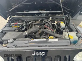 2007 Jeep Wrangler Rubicon с VIN 1J4GA64127L170574, выставлен на аукционе Copart как лот 60906965 с пробегом 142 976 миль миль и Чистый • Clean title. История ставок и продаж доступна на DreamBid. Изображение 7.