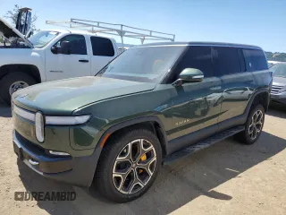 2023 Rivian R1S Launch Edition z VIN 7PDSGABL9PN007715, wystawiony jako Copart lot #55975495 z przebiegiem 29 067 mil mil oraz Szkody całkowita. Historia ofert i sprzedaży dostępna na DreamBid. Obrazek 1.