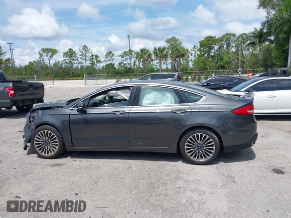 2018 Ford Fusion Titanium with VIN 3FA6P0D9XJR169657, listed as a IAAI auction lot 42392112 with 62,754 mi miles and . Bid and sale history available at DreamBid. Image 15.