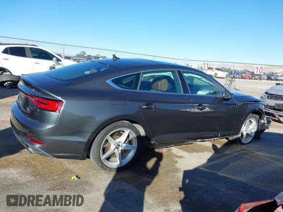 2018 Audi A5 Sportback Premium z VIN WAUDNCF52JA044291, wystawiony jako IAAI lot #41219360 z przebiegiem 86 273 mil mil oraz . Historia ofert i sprzedaży dostępna na DreamBid. Obrazek 13.