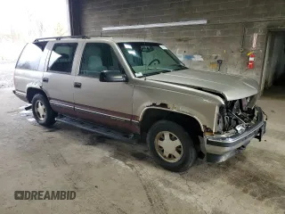 1998 GMC Yukon with VIN 1GKEC13R9WJ715363, listed as a Copart auction lot 81483814 with 186,437 mi miles and Salvage Title. Bid and sale history available at carsss.com. Image 4.