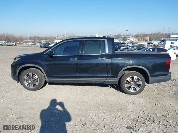 2019 Honda Ridgeline RTL-E with VIN 5FPYK3F7XKB033652, listed as a IAAI auction lot 41751421 with 96,774 mi miles. Bid and sale history available at carsss.com. Image 13.