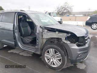 2019 Volkswagen Atlas SE z VIN 1V2WR2CA9KC503400, wystawiony jako IAAI lot #41920119 z przebiegiem 91 208 mil mil oraz . Historia ofert i sprzedaży dostępna na DreamBid. Obrazek 6.