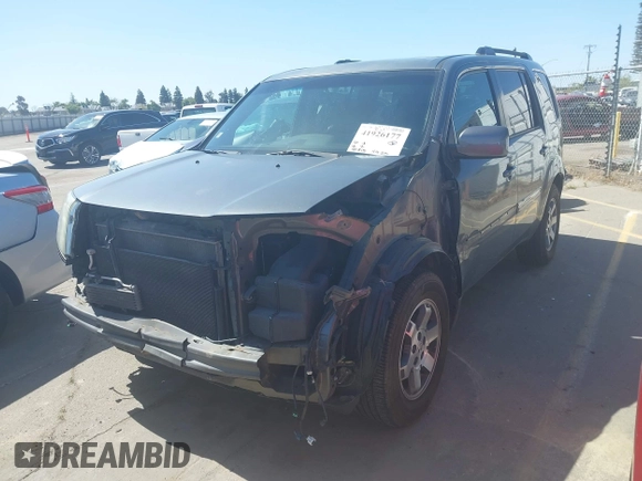 2011 Honda Pilot Touring with VIN 5FNYF4H96BB083532, listed as a IAAI auction lot 41926177 with 100,815 mi miles. Bid and sale history available at carsss.com. Image 23.