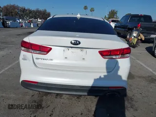 2016 Kia Optima LX with VIN 5XXGT4L33GG014082, listed as a IAAI auction lot 41870030 with 137,849 mi miles and . Bid and sale history available at DreamBid. Image 15.