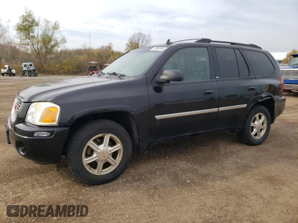 2007 GMC Envoy SLT with VIN 1GKDT13S972197393, listed as a Copart auction lot 77958764 with 151,586 mi miles and Salvage Title. Bid and sale history available at DreamBid. Image 1.