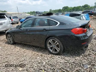 2017 BMW 4 Series 430i xDrive with VIN WBA4F9C56HG792005, listed as a Copart auction lot 59669735 with Not provided miles and Salvage title. Bid and sale history available at DreamBid. Image 2.