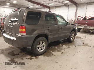 2006 Ford Escape XLT with VIN 1FMYU03Z46KD45641, listed as a IAAI auction lot 41395071 with 120,052 mi miles. Bid and sale history available at carsss.com. Image 4.