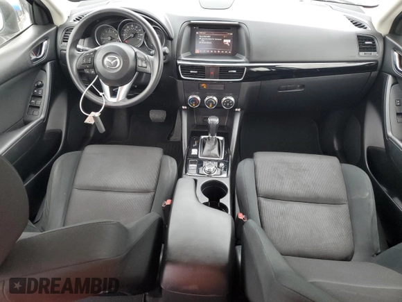 2016 Mazda CX-5 Sport with VIN JM3KE4BY1G0799275, listed as a Copart auction lot 51202355 with 98,409 mi miles and Non Repairable. Bid and sale history available at carsss.com. Image 8.