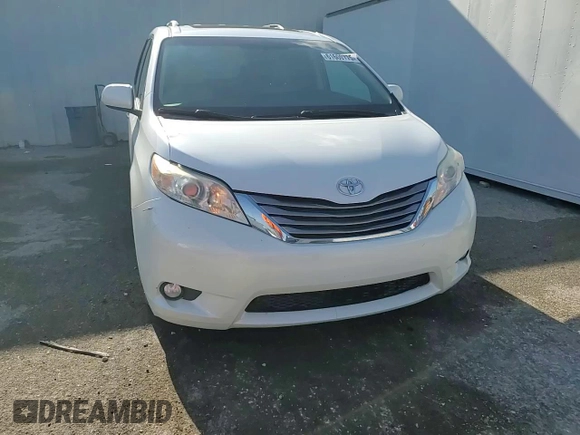 2015 Toyota Sienna XLE with VIN 5TDYK3DC0FS679812, listed as a Copart auction lot 61600775 with 118,483 mi miles and Salvage title. Bid and sale history available at DreamBid. Image 15.