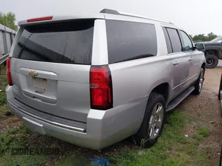2015 Chevrolet Suburban LTZ with VIN 1GNSCKKC3FR225723, listed as a IAAI auction lot 42577863 with 267,557 mi miles and . Bid and sale history available at DreamBid. Image 4.