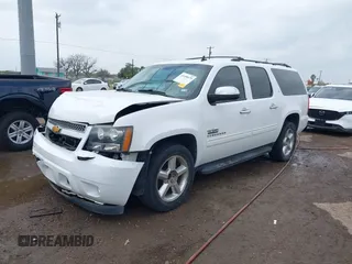 2014 Chevrolet Suburban LT with VIN 1GNSCJE04ER107836, listed as a IAAI auction lot 41698679 with 106,139 mi miles. Bid and sale history available at carsss.com. Image 17.