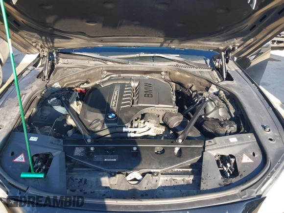 2013 BMW 7 Series 740i with VIN WBAYA6C55DC995094, listed as a IAAI auction lot 41246796 with 164,394 mi miles. Bid and sale history available at carsss.com. Image 10.
