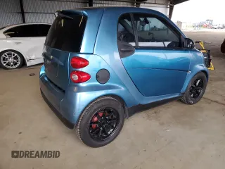 2009 Smart fortwo Pure with VIN WMEEJ31XX9K264071, listed as a Copart auction lot 55315705 with 117,006 mi miles and Salvage Title. Bid and sale history available at carsss.com. Image 3.