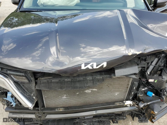 2023 Kia Carnival SX Prestige with VIN KNDNE5H32P6277047, listed as a Copart auction lot 65746354 with 23,873 mi miles and Salvage Title. Bid and sale history available at carsss.com. Image 12.