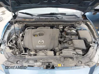 2015 Mazda 3 i SV z VIN JM1BM1T77F1251936, wystawiony jako IAAI lot #42124495 z przebiegiem 82 805 mil mil oraz . Historia ofert i sprzedaży dostępna na DreamBid. Obrazek 10.