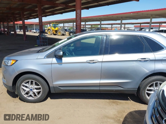 2021 Ford Edge SEL z VIN 2FMPK4J98MBA50772, wystawiony jako IAAI lot #42224052 z przebiegiem 76 061 mil mil oraz . Historia ofert i sprzedaży dostępna na DreamBid. Obrazek 14.