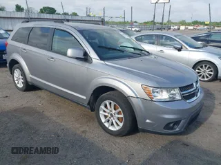 2016 Dodge Journey SXT with VIN 3C4PDDBG7GT196519, listed as a IAAI auction lot 42030547 with 175,726 mi miles. Bid and sale history available at carsss.com. Image 1.