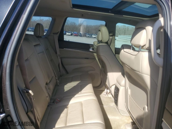 2017 Jeep Grand Cherokee Overland with VIN 1C4RJECG2HC712823, listed as a Copart auction lot 48063325 with 124,812 mi miles and Salvage Title. Bid and sale history available at carsss.com. Image 11.