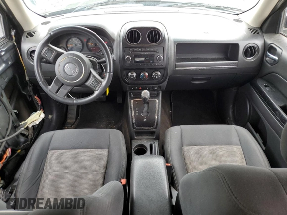 2014 Jeep Patriot Latitude with VIN 1C4NJRFB2ED718259, listed as a Copart auction lot 58095825 with 116,665 mi miles and Salvage title. Bid and sale history available at DreamBid. Image 8.