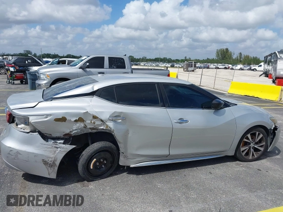 2016 Nissan Maxima SL with VIN 1N4AA6AP0GC433932, listed as a IAAI auction lot 41897180 with 91,871 mi miles and . Bid and sale history available at DreamBid. Image 18.