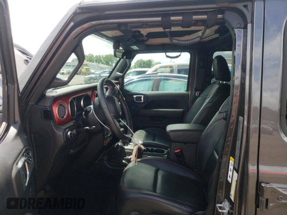 2018 Jeep Wrangler Unlimited Rubicon with VIN 1C4HJXFG1JW261472, listed as a Copart auction lot 63259345 with 60,457 mi miles and Salvage title. Bid and sale history available at DreamBid. Image 7.