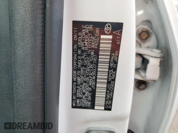 2012 Toyota Yaris z VIN JTDBT4K35CL017457, wystawiony jako Copart lot #58820985 z przebiegiem 120 901 mil mil oraz Szkoda całkowita • Salvage title. Historia ofert i sprzedaży dostępna na DreamBid. Obrazek 12.