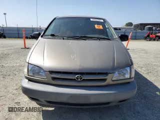 1999 Toyota Sienna CE z VIN 4T3ZF19C4XU163765, wystawiony jako Copart lot #54405805 z przebiegiem Nie podano mil oraz Szkody całkowita. Historia ofert i sprzedaży dostępna na DreamBid. Obrazek 5.