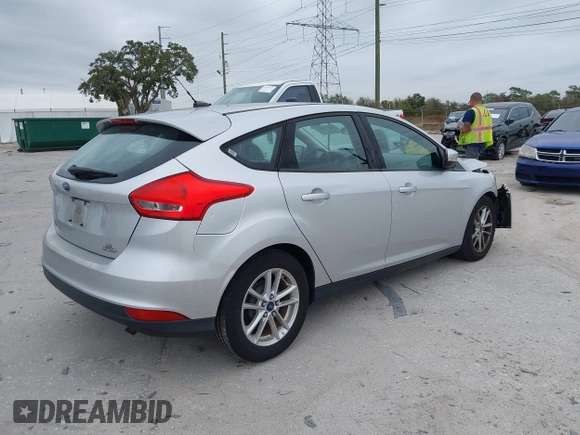 2015 Ford Focus SE with VIN 1FADP3K25FL328797, listed as a IAAI auction lot 41328404 with 72,368 mi miles. Bid and sale history available at carsss.com. Image 4.