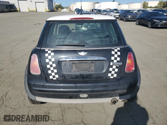 2004 MINI Hardtop with VIN WMWRC33464TJ62893, listed as a Copart auction lot 51905565 with 141,958 mi miles and Salvage Title. Bid and sale history available at DreamBid. Image 6.
