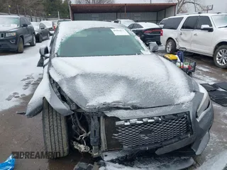 2015 Infiniti Q50 Premium with VIN JN1BV7AR0FM396192, listed as a IAAI auction lot 41564677 with 210,460 mi miles and . Bid and sale history available at DreamBid. Image 13.