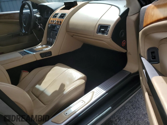 2007 Aston Martin DB9 z VIN SCFAD01A77GA07808, wystawiony jako Copart lot #48063115 z przebiegiem 53 195 mil mil oraz Szkody całkowita. Historia ofert i sprzedaży dostępna na DreamBid. Obrazek 8.