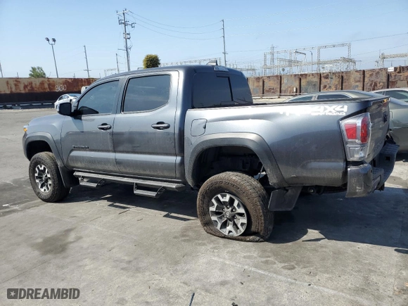 2022 Toyota Tacoma 4WD SR with VIN 3TMCZ5AN6NM511288, listed as a Copart auction lot 50429285 with 33,740 mi miles and Salvage Title. Bid and sale history available at carsss.com. Image 2.