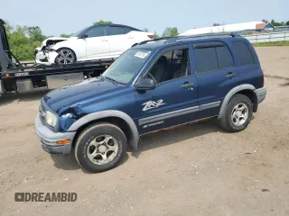 2004 Chevrolet Tracker ZR2 z VIN 2CNBJ734346903751, wystawiony jako Copart lot #59300765 z przebiegiem 126 924 mil mil oraz Szkoda całkowita • Salvage title. Historia ofert i sprzedaży dostępna na DreamBid. Obrazek 1.