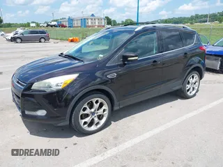 2013 Ford Escape Titanium with VIN 1FMCU9J90DUA01551, listed as a IAAI auction lot 42686247 with 190,707 mi miles and . Bid and sale history available at DreamBid. Image 2.