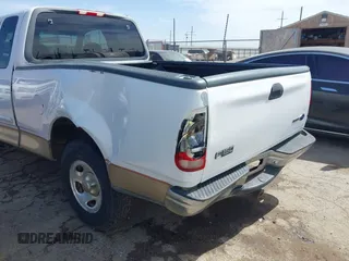 1999 Ford F-150 with VIN 1FTZX1720XKB31945, listed as a IAAI auction lot 42123984 with 187,766 mi miles and . Bid and sale history available at DreamBid. Image 6.