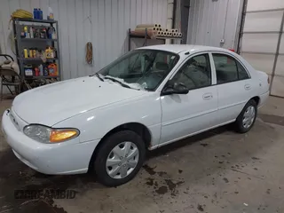 2001 Ford Escort Fleet with VIN 3FAFP13P11R235177, listed as a IAAI auction lot 41591480 with 98,403 mi miles. Bid and sale history available at carsss.com. Image 2.