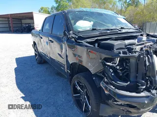 2019 Ram 1500 Big Horn z VIN 1C6SRFFTXKN796983, wystawiony jako IAAI lot #41841668 z przebiegiem 64 170 mil mil oraz . Historia ofert i sprzedaży dostępna na DreamBid. Obrazek 1.