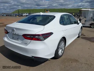 2023 Toyota Camry LE with VIN 4T1C11AK7PU135832, listed as a IAAI auction lot 41711116 with 43,115 mi miles. Bid and sale history available at carsss.com. Image 4.