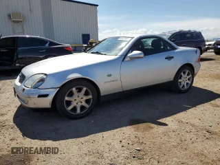 1998 Mercedes-Benz SLK 230/320 with VIN WDBKK47F9WF057337, listed as a Copart auction lot 65023905 with 243,917 mi miles and Salvage title. Bid and sale history available at DreamBid. Image 1.