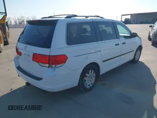 2010 Honda Odyssey LX z VIN 5FNRL3H29AB017405, wystawiony jako IAAI lot #41636159 z przebiegiem 187 667 mil mil oraz . Historia ofert i sprzedaży dostępna na DreamBid. Obrazek 4.
