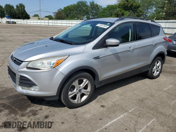 2014 Ford Escape SE with VIN 1FMCU9GX3EUB19987, listed as a Copart auction lot 64042695 with 96,775 mi miles and Salvage title. Bid and sale history available at DreamBid. Image 1.