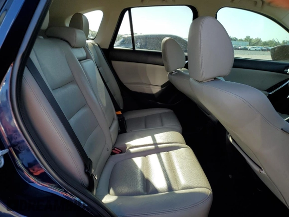 2014 Mazda CX-5 Grand Touring with VIN JM3KE2DY8E0361108, listed as a Copart auction lot 52876965 with 116,135 mi miles and Salvage Title. Bid and sale history available at carsss.com. Image 11.
