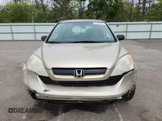 2009 Honda CR-V LX z VIN 5J6RE48309L006028, wystawiony jako Copart lot #58186465 z przebiegiem 214 896 mil mil oraz Szkoda całkowita • Salvage title. Historia ofert i sprzedaży dostępna na DreamBid. Obrazek 5.
