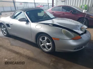 2002 Porsche Boxster z VIN WP0CA29842U623941, wystawiony jako IAAI lot #41253243 z przebiegiem Nie podano mil oraz . Historia ofert i sprzedaży dostępna na DreamBid. Obrazek 1.